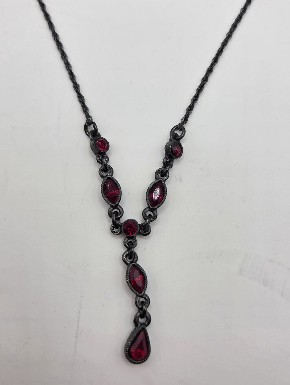 Vintage ruby marquise drop necklace with dark chain. Adjustable.